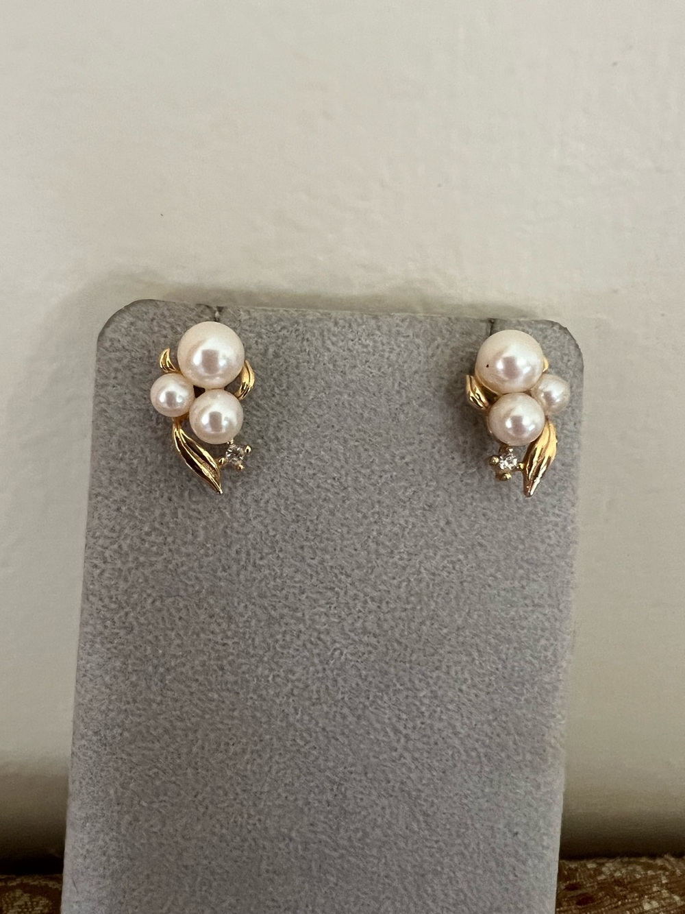 Beautiful faux pearl and diamond gold post earrings